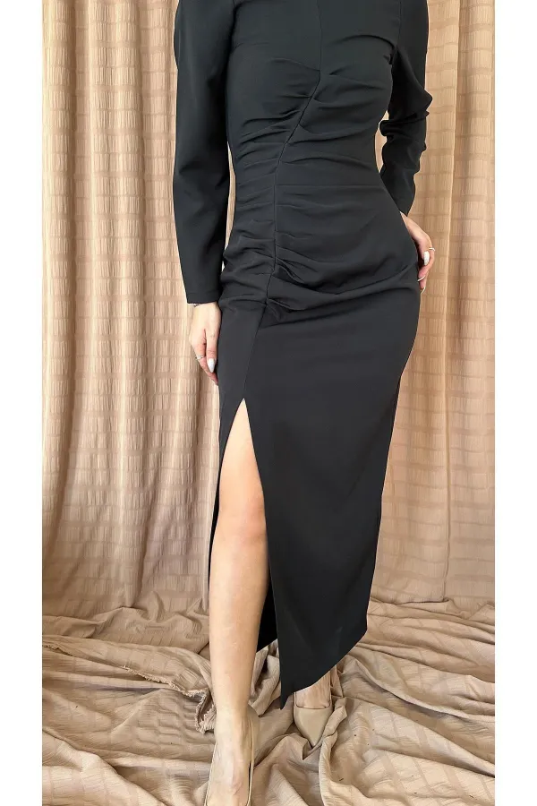 Robe longue noire plissée fendue en gros