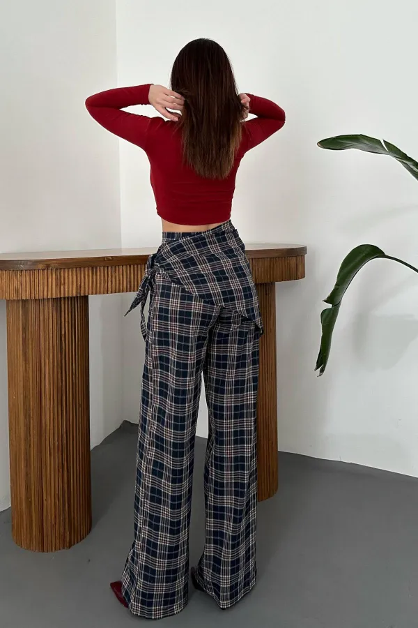 Pantalon bleu marine à ceinture et liens latéraux en gros