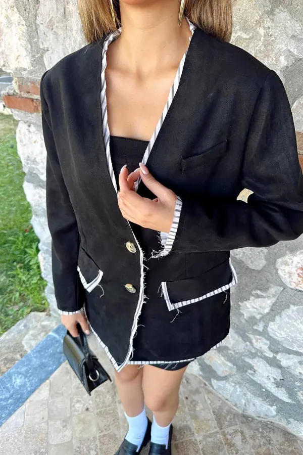 Veste en daim noir rayée et garnie, en gros