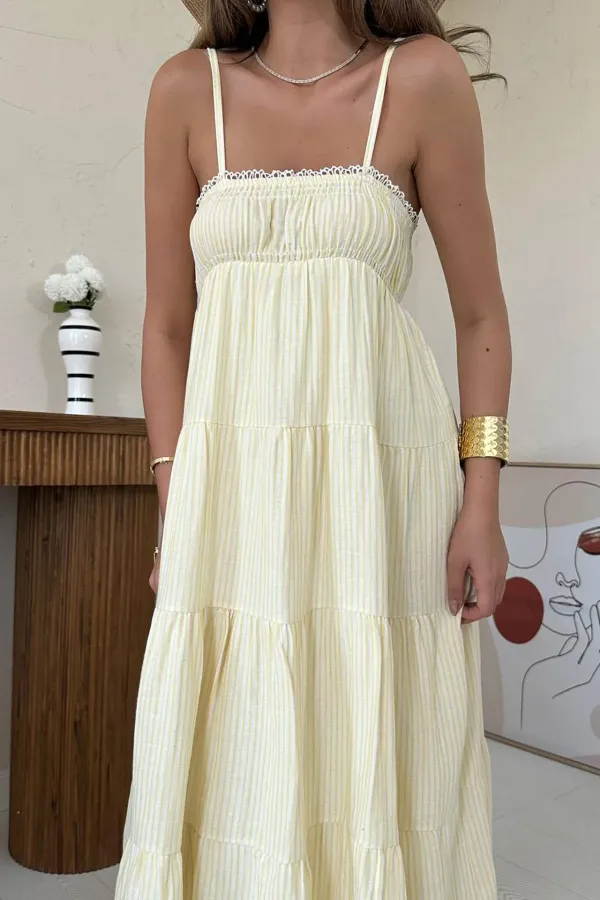 Robe en mousseline rayée jaune à bretelles en gros