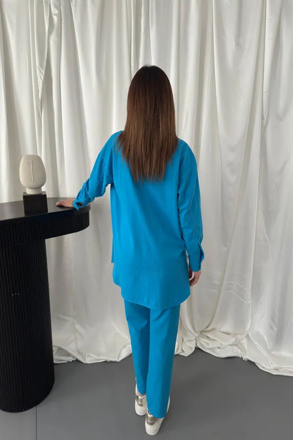 Ensemble chemise bleue et pantalon à pression en gros