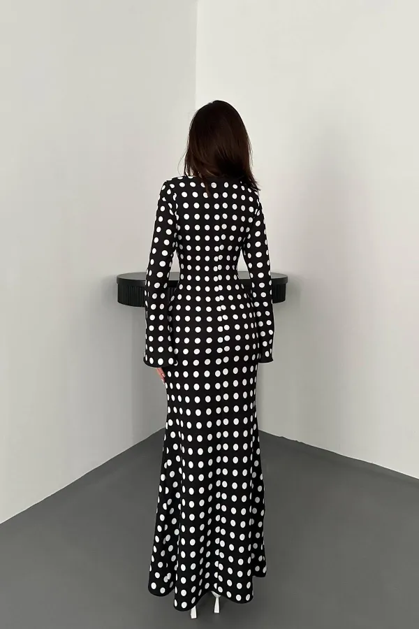 Robe moulante noire à pois en gros
