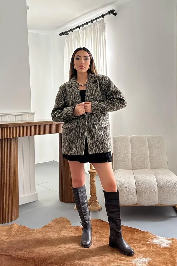 Veste en laine léopard en gros