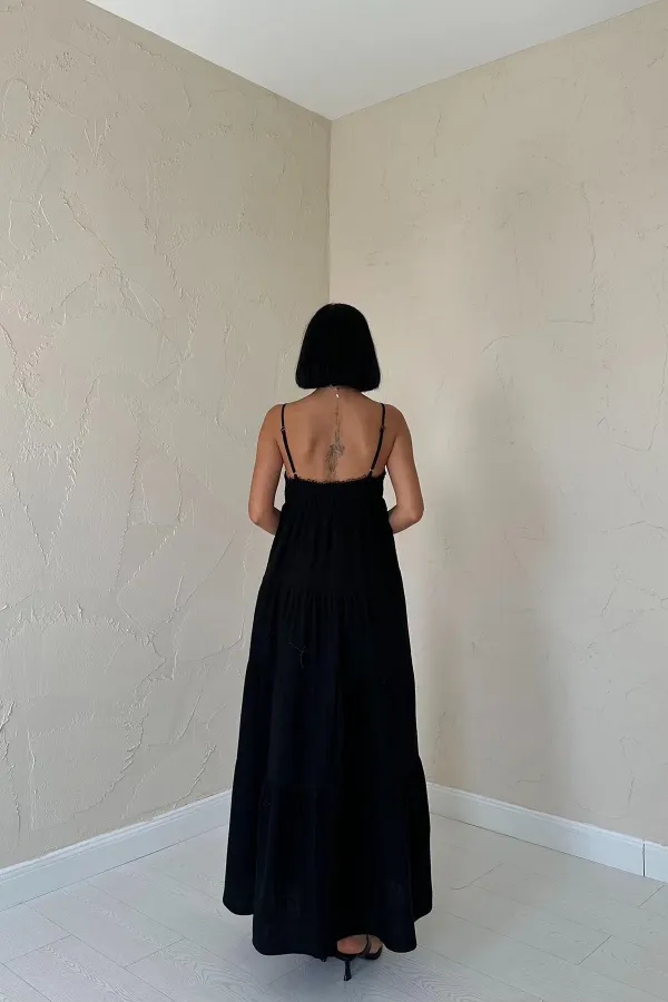 Robe en mousseline noire à bretelles en gros