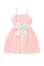 Robe rose à pois pour filles avec ruban blanc