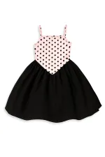 Robe de fille à pois roses et noirs