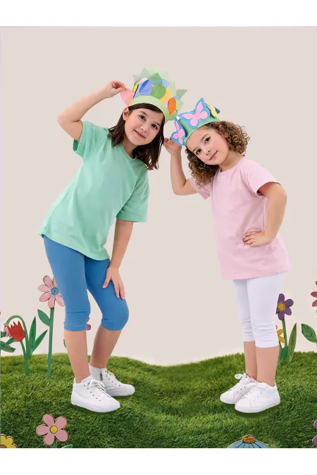 Ensemble deux pièces pour fille : débardeur et legging blanc cassé et bleu.