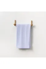 Couverture bébé tricotée à motifs bleue