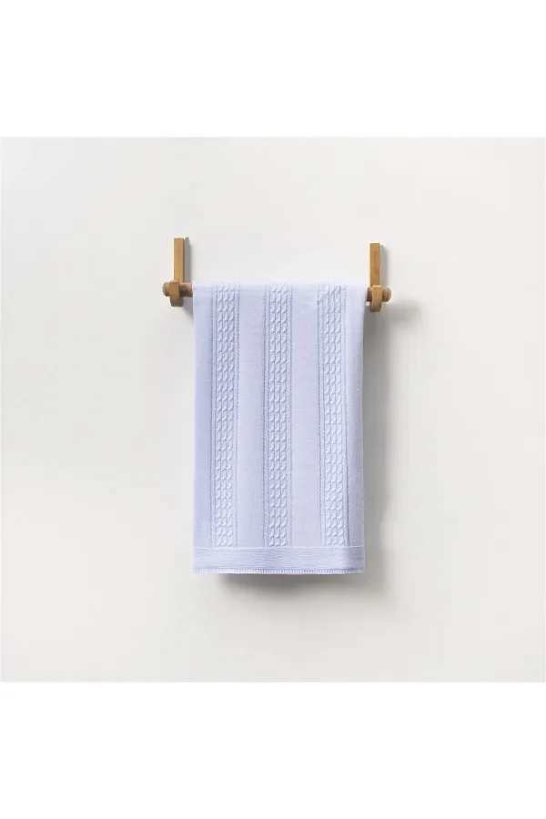 Couverture bébé tricotée à motifs bleue