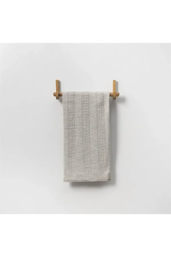 Couverture bébé tricotée à motifs grise