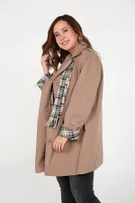 PLUS SIZE BONDIT TRENCH COAT WITH LINED, ZIPPED POCKETS AND SCARF ACCESSORY.