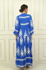 Robe longue hijab imprimée avec demi-boutonnage sur le devant et manches élastiques