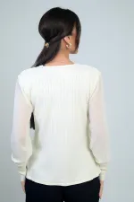 Pull sans manches en mousseline à col en V pour femme