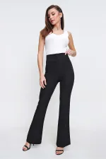 Pantalon espagnol taille haute, à poches, extensible et à jambes larges