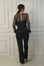 Women's Tulle Leaf Flock Printed Belted Crepe Jumpsuit with Feathered Sleeves