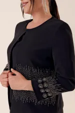 Costume BB trois pièces importé, doublé de crêpe et orné de perles