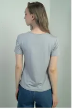 Chemisier à manches courtes et col en V pour femme avec fente