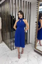 Robe en mousseline doublée et entièrement plissée