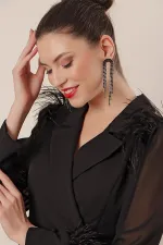 Wrap-neck, belted waist, front slit, chiffon sleeves with cuffs and feather detail, crepe dress.