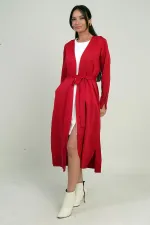 Gilet long pour femme avec manches boutonnées, poches et fentes latérales