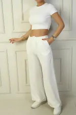 Pantalon palazzo à poches plissées pour femme