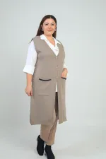 Gilet long en maille grande taille pour femme avec détails rayés sur les poches