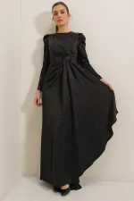 Long-sleeved satin dress with pleat detail at the front and lining.