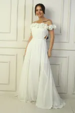 Robe longue en mousseline pour femme, ornée d'un décolleté floral découpé au laser, doublée et ceinturée à la taille.