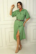 Long dress with button front, belted waist, and double pockets, linen-effect finish.