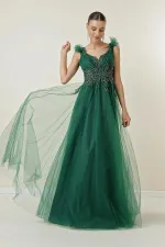 Robe longue en tulle avec lien au dos, ornements de perles et doublure