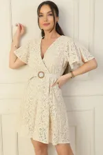 Wrap-neck, belted waist, lined, ruffled sleeves, slit, lace dress.
