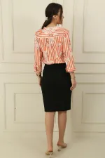 jupe fendue jusqu'aux genoux