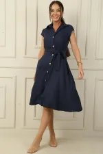 Button-front, belted, pocketed linen-effect dress.