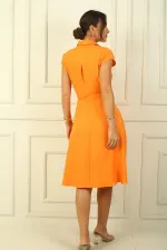 Button-front, belted, pocketed linen-effect dress.