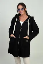 Gilet en boucle confortable à capuche et poche zippée pour femme