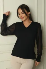 Pull sans manches en mousseline à col en V pour femme