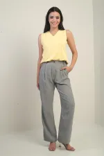 Pantalon palazzo pour femme avec taille élastiquée, poches et détails plissés