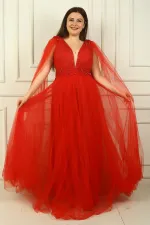 Robe de soirée longue en tulle pour femme, décolleté en V devant et dos, ornée de perles et à taille large.