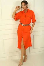 Long dress with button front, belted waist, and double pockets, linen-effect finish.