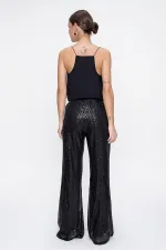 Pantalon en tulle doublé de sequins à taille élastique