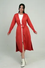 Gilet long pour femme avec manches boutonnées, poches et fentes latérales