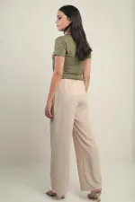 Pantalon palazzo pour femme avec taille élastiquée, poches et détails plissés