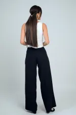 Pantalon en tricot à jambes larges et fermeture éclair latérale pour femme