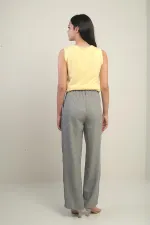 Pantalon palazzo pour femme avec taille élastiquée, poches et détails plissés