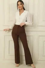 Pantalon taille haute à pattes d'éléphant en lycra avec poches