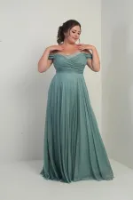 Robe longue BB à paillettes, sans bretelles, ornée de pierres et décolleté bustier.