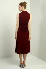 Robe midi en lin à col polo pour femme, ornée d'un pli sur le devant et de boutons.