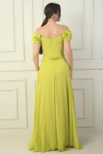 Robe longue en mousseline pour femme, ornée d'un décolleté floral découpé au laser, doublée et ceinturée à la taille.