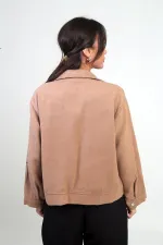 Manteau court en cachemire pour femme avec poche kangourou zippée sur le devant