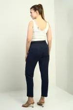 Pantalon slim à rayures verticales et taille élastique pour femme, avec poches